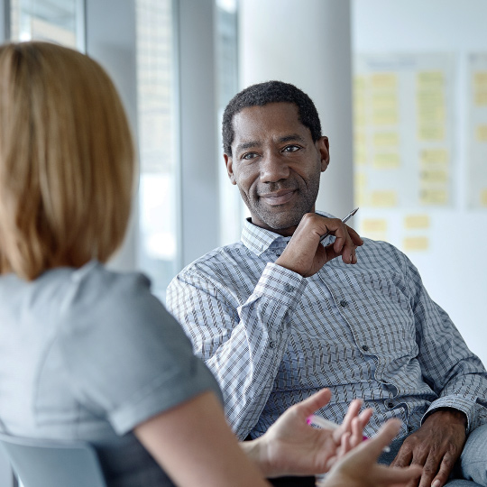 Two business people talking.